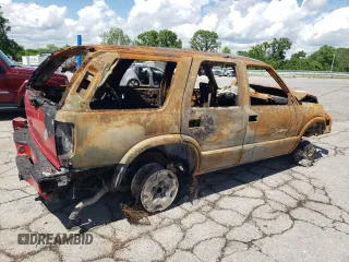 2004 Chevrolet Blazer LS z VIN 1GNDT13X24K141323, wystawiony jako Copart lot #56503905 z przebiegiem Nie podano mil oraz Nie do naprawy • Non repairable. Historia ofert i sprzedaży dostępna na DreamBid. Obrazek 3.