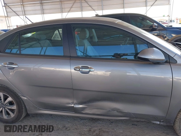 2023 Kia Rio S z VIN 3KPA24AD1PE579816, wystawiony jako IAAI lot #41349202 z przebiegiem 5784 mil mil oraz . Historia ofert i sprzedaży dostępna na DreamBid. Obrazek 13.