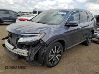 2022 Honda Pilot Touring 7-Passenger z VIN 5FNYF6H6XNB014347, wystawiony jako Copart lot #56869745 z przebiegiem 31 513 mil mil oraz Szkoda całkowita • Salvage title. Historia ofert i sprzedaży dostępna na DreamBid. Obrazek 1.