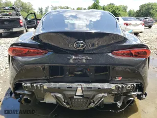 2021 Toyota GR Supra 3.0 with VIN WZ1DB0C04MW035703, listed as a Copart auction lot 61306374 with 46,176 mi miles and Salvage Title. Bid and sale history available at carsss.com. Image 6.