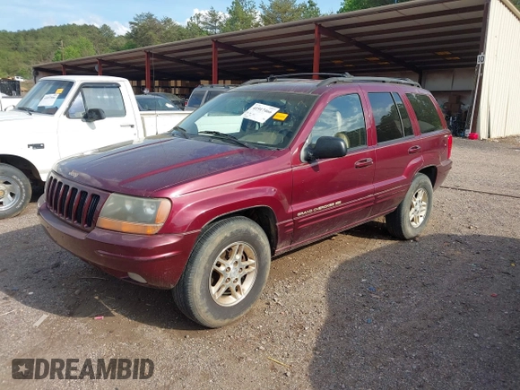 1999 Jeep Grand Cherokee Limited with VIN 1J4GW68N8XC595697, listed as a IAAI auction lot 41917466 with 177,944 mi miles. Bid and sale history available at carsss.com. Image 2.
