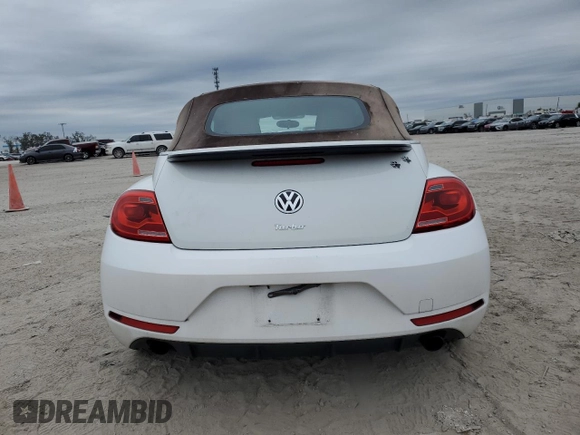2013 Volkswagen Beetle with VIN 3VW7S7AT9DM816943, listed as a Copart auction lot 88466695 with 77,265 mi miles and Salvage Title. Bid and sale history available at DreamBid. Image 6.