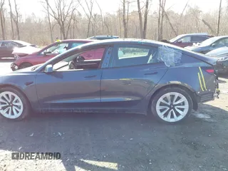 2022 Tesla Model 3 Long Range with VIN 5YJ3E1EB0NF365284, listed as a IAAI auction lot 41899706 with 36,463 mi miles and . Bid and sale history available at DreamBid. Image 15.