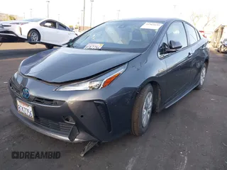 2020 Toyota Prius L Eco z VIN JTDKARFU9L3122010, wystawiony jako IAAI lot #41969655 z przebiegiem 76 250 mil mil oraz . Historia ofert i sprzedaży dostępna na DreamBid. Obrazek 2.