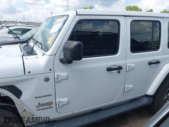 2018 Jeep Wrangler Unlimited Sahara with VIN 1C4HJXEG1JW205789, listed as a IAAI auction lot 42435877 with 57,587 mi miles and . Bid and sale history available at DreamBid. Image 15.