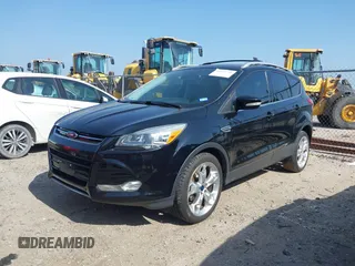 2016 Ford Escape Titanium with VIN 1FMCU0JX5GUC88013, listed as a IAAI auction lot 41933751 with 77,789 mi miles. Bid and sale history available at carsss.com. Image 18.