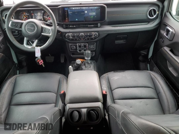 2024 Jeep Wrangler Sahara with VIN 1C4PJXENXRW153777, listed as a Copart auction lot 46066605 with 16,707 mi miles and Salvage Title. Bid and sale history available at DreamBid. Image 8.