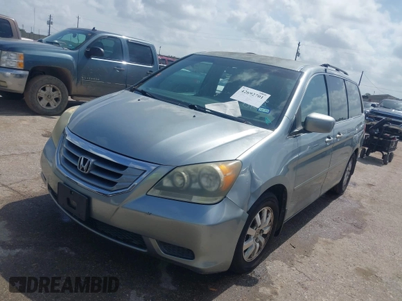 2010 Honda Odyssey EX with VIN 5FNRL3H42AB002679, listed as a IAAI auction lot 42692701 with 179,905 mi miles and . Bid and sale history available at DreamBid. Image 2.