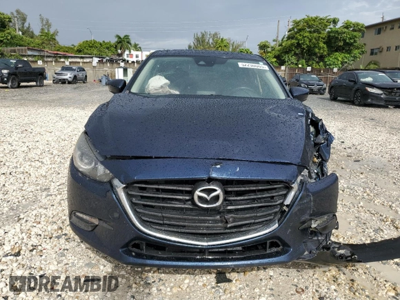 2018 Mazda 3 Touring with VIN 3MZBN1L38JM239636, listed as a Copart auction lot 52290065 with 73,731 mi miles and Salvage Title. Bid and sale history available at carsss.com. Image 5.