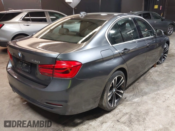2018 BMW 3 Series 330i xDrive with VIN WBA8D9C51JEM34061, listed as a IAAI auction lot 42682318 with 65,245 mi miles and . Bid and sale history available at DreamBid. Image 4.