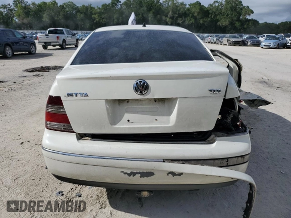 2004 Volkswagen Jetta GLS с VIN 3VWSR69M14M143742, выставлен на аукционе Copart как лот 62860135 с пробегом 322 904 миль миль и Списание • Salvage title. История ставок и продаж доступна на DreamBid. Изображение 6.