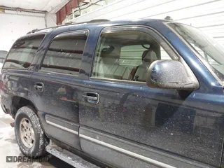 2004 Chevrolet Tahoe LT with VIN 1GNEK13T14J195982, listed as a IAAI auction lot 41589336 with 244,854 mi miles. Bid and sale history available at carsss.com. Image 6.