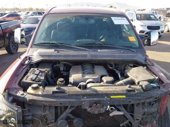 2004 Nissan Titan XE with VIN 1N6AA06A24N584067, listed as a IAAI auction lot 41568800 with 184,664 mi miles. Bid and sale history available at carsss.com. Image 10.