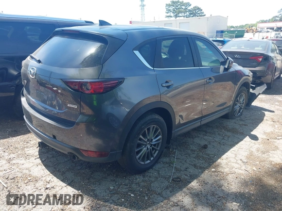 2017 Mazda CX-5 Touring with VIN JM3KFACL5H0197432, listed as a IAAI auction lot 42060117 with 1 mi miles. Bid and sale history available at carsss.com. Image 4.
