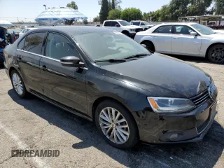 2014 Volkswagen Jetta TDI w/Premium with VIN 3VWLL7AJ8EM367587, listed as a Copart auction lot 63670815 with 129,289 mi miles and Clean title. Bid and sale history available at DreamBid. Image 4.