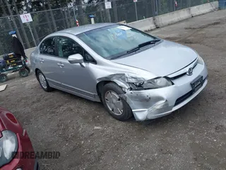 2007 Honda Civic z VIN JHMFA36257S006066, wystawiony jako IAAI lot #41960160 z przebiegiem 297 681 mil mil oraz . Historia ofert i sprzedaży dostępna na DreamBid. Obrazek 1.