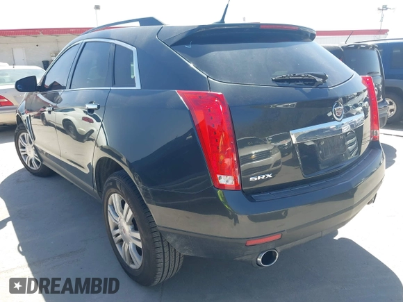 2014 Cadillac SRX z VIN 3GYFNAE35ES610751, wystawiony jako IAAI lot #41832296 z przebiegiem 133 293 mil mil oraz . Historia ofert i sprzedaży dostępna na DreamBid. Obrazek 3.