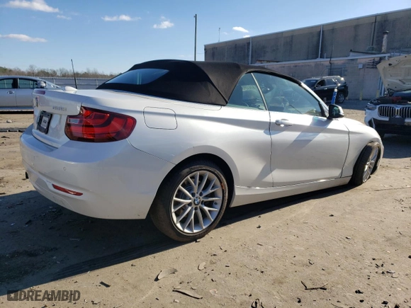 2015 BMW 2 Series 228i xDrive with VIN WBA1K7C57FV235082, listed as a Copart auction lot 87412554 with 75,061 mi miles and Salvage Title. Bid and sale history available at carsss.com. Image 3.