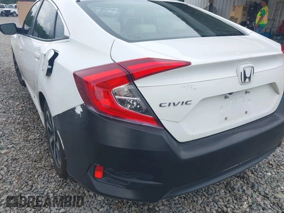 2017 Honda Civic LX with VIN 19XFC2F58HE010262, listed as a IAAI auction lot 42118124 with 125,535 mi miles and . Bid and sale history available at DreamBid. Image 6.