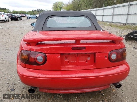 1990 Mazda MX-5 Miata with VIN JM1NA3512L0125981, listed as a Copart auction lot 52803875 with 218,423 mi miles and Clean title. Bid and sale history available at DreamBid. Image 6.