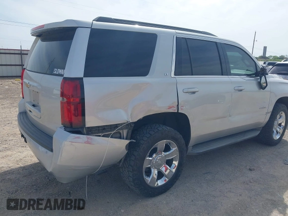 2015 Chevrolet Tahoe LT with VIN 1GNSCBKC9FR111984, listed as a IAAI auction lot 42003685 with 186,391 mi miles and . Bid and sale history available at DreamBid. Image 6.