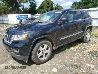 2011 Jeep Grand Cherokee Laredo z VIN 1J4RR4GG7BC512633, wystawiony jako Copart lot #64906055 z przebiegiem 233 036 mil mil oraz Czysty tytuł • Clean title. Historia ofert i sprzedaży dostępna na DreamBid. Obrazek 1.