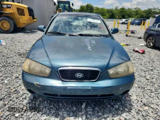 2001 Hyundai Elantra GLS z VIN KMHDN45D61U132398, wystawiony jako Copart lot #61164165 z przebiegiem 162 729 mil mil oraz Szkoda całkowita • Salvage title. Historia ofert i sprzedaży dostępna na DreamBid. Obrazek 5.