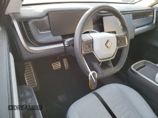2024 Rivian R1S Adventure with VIN 7PDSGABA4RN031387, listed as a Copart auction lot 75098504 with Not Provided miles and Salvage Title. Bid and sale history available at carsss.com. Image 8.