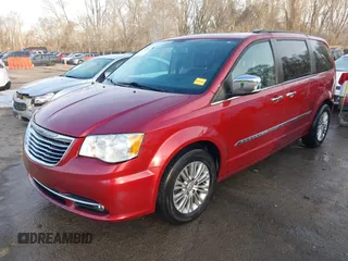 2015 Chrysler Town & Country Touring-L with VIN 2C4RC1CG7FR674321, listed as a IAAI auction lot 41750796 with 165,179 mi miles. Bid and sale history available at carsss.com. Image 2.