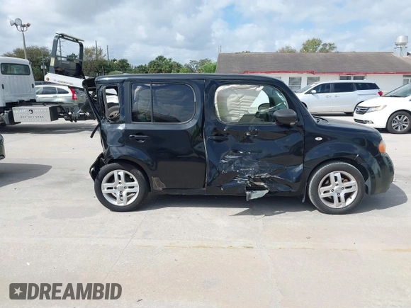 2009 Nissan Cube SL z VIN JN8AZ28R59T103584, wystawiony jako IAAI lot #41685022 z przebiegiem 158 810 mil mil oraz . Historia ofert i sprzedaży dostępna na DreamBid. Obrazek 12.