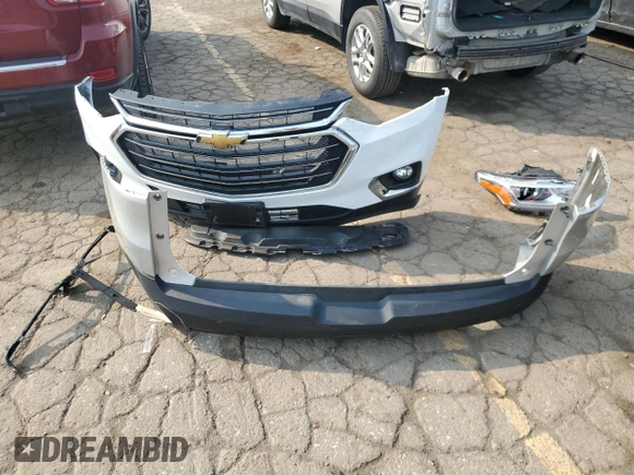 2020 Chevrolet Traverse LS z VIN 1GNERFKW8LJ160889, wystawiony jako Copart lot #59148015 z przebiegiem 107 696 mil mil oraz Szkoda całkowita • Salvage title. Historia ofert i sprzedaży dostępna na DreamBid. Obrazek 13.