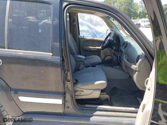 2006 Jeep Liberty Sport with VIN 1J4GK48K46W246801, listed as a IAAI auction lot 42048509 with 219,077 mi miles. Bid and sale history available at carsss.com. Image 5.