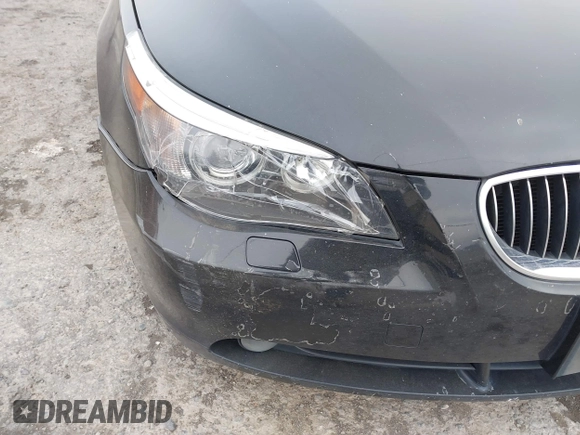 2007 BMW 5 Series 530i with VIN WBANE735X7CM46704, listed as a IAAI auction lot 41766712 with 172,163 mi miles. Bid and sale history available at carsss.com. Image 6.