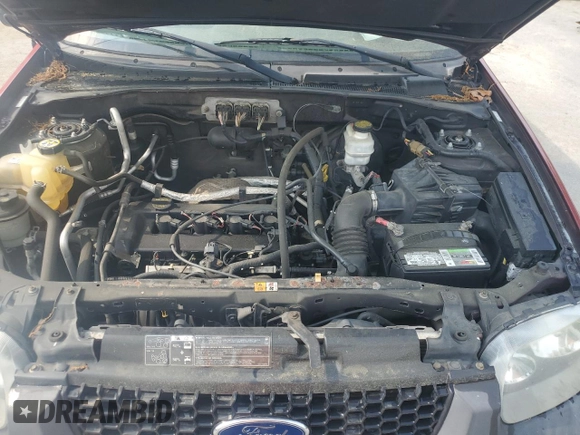 2007 Ford Escape XLS with VIN 1FMYU92ZX7KB69167, listed as a Copart auction lot 59600185 with 162,442 mi miles and Salvage title. Bid and sale history available at DreamBid. Image 12.