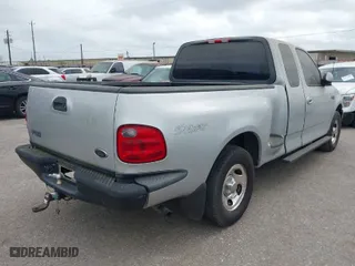 2003 Ford F-150 XL with VIN 1FTRX07253KB95404, listed as a IAAI auction lot 41945734 with 1 mi miles. Bid and sale history available at carsss.com. Image 4.