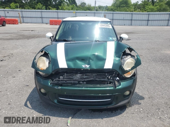2011 MINI Hardtop with VIN WMWSU3C51BTX95581, listed as a Copart auction lot 60443995 with 157,213 mi miles and Salvage title. Bid and sale history available at DreamBid. Image 5.