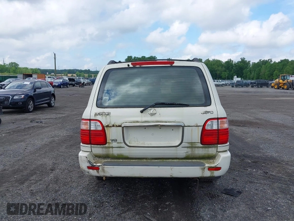 2001 Lexus LX 470 z VIN JTJHT00W613506010, wystawiony jako IAAI lot #42277268 z przebiegiem 186 671 mil mil oraz . Historia ofert i sprzedaży dostępna na DreamBid. Obrazek 16.