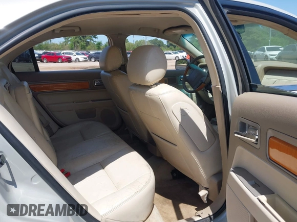 2007 Lincoln MKZ with VIN 3LNHM26T47R627262, listed as a IAAI auction lot 41970463 with 218,828 mi miles. Bid and sale history available at carsss.com. Image 8.