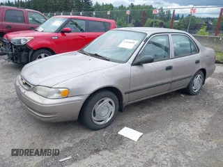 2000 Toyota Corolla VE with VIN 1NXBR12E5YZ366906, listed as a IAAI auction lot 42616850 with 134,976 mi miles and . Bid and sale history available at DreamBid. Image 2.