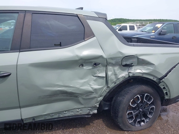 2022 Hyundai Santa Cruz SEL with VIN 5NTJB4AEXNH034989, listed as a IAAI auction lot 42176050 with 27,297 mi miles and . Bid and sale history available at DreamBid. Image 6.