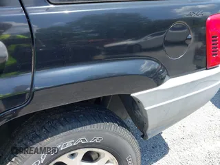 2000 Jeep Grand Cherokee Laredo with VIN 1J4GW48N7YC357376, listed as a IAAI auction lot 42503429 with 211,154 mi miles and . Bid and sale history available at DreamBid. Image 13.