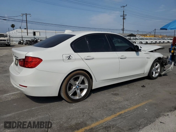 2015 BMW 3 Series 328i with VIN WBA3A5C56FF606517, listed as a Copart auction lot 59388115 with 185,684 mi miles and Salvage title. Bid and sale history available at DreamBid. Image 3.