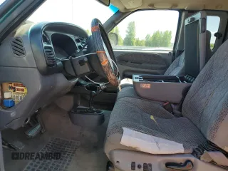 1999 Dodge 2500 with VIN 1B7KF23W2XJ539940, listed as a Copart auction lot 64237595 with 211,718 mi miles and Salvage title. Bid and sale history available at DreamBid. Image 7.