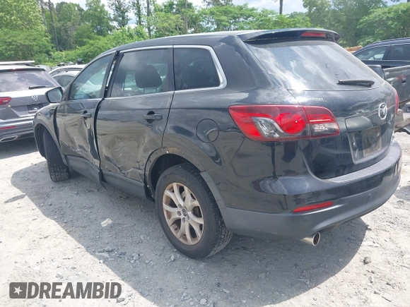 2013 Mazda CX-9 Touring with VIN JM3TB2CA4D0404858, listed as a IAAI auction lot 42164199 with 177,463 mi miles and . Bid and sale history available at DreamBid. Image 3.