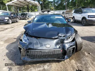 2023 Toyota GR86 Premium with VIN JF1ZNBF12P8765815, listed as a Copart auction lot 69377494 with 5,382 mi miles and Salvage Title. Bid and sale history available at carsss.com. Image 5.