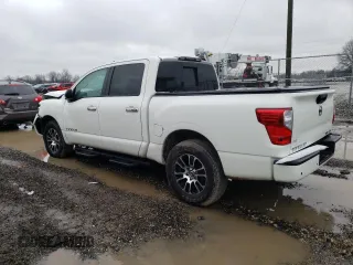 2021 Nissan Titan S with VIN 1N6AA1EC2MN529675, listed as a Copart auction lot 86612844 with 56,597 mi miles and Salvage title. Bid and sale history available at DreamBid. Image 2.