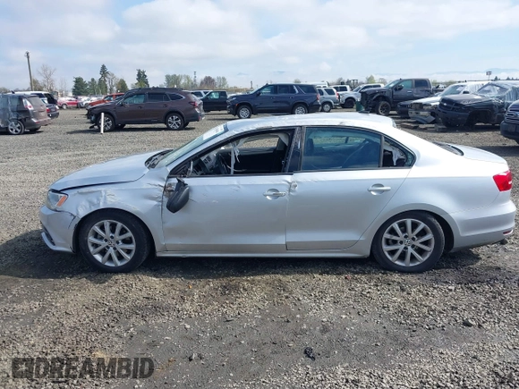 2015 Volkswagen Jetta Sedan 1.8T SE with VIN 3VWD17AJ3FM297573, listed as a IAAI auction lot 41884541 with 98,225 mi miles. Bid and sale history available at carsss.com. Image 14.