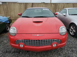 2003 Ford Thunderbird Deluxe z VIN 1FAHP60A13Y105202, wystawiony jako Copart lot #74541534 z przebiegiem 18 518 mil mil oraz Nie do naprawy • Non repairable. Historia ofert i sprzedaży dostępna na DreamBid. Obrazek 5.