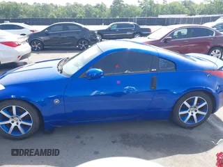 2004 Nissan 350Z Enthusiast z VIN JN1AZ34D34T150619, wystawiony jako IAAI lot #42248408 z przebiegiem 276 869 mil mil oraz . Historia ofert i sprzedaży dostępna na DreamBid. Obrazek 14.