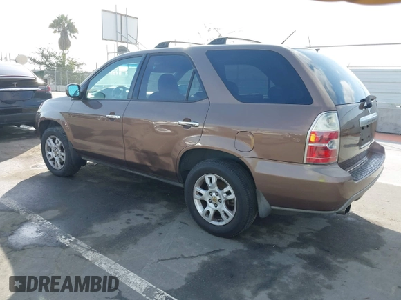 2004 Acura MDX Touring Pkg w/Navigation with VIN 2HNYD18854H511500, listed as a IAAI auction lot 41581417 with 223,757 mi miles. Bid and sale history available at carsss.com. Image 3.